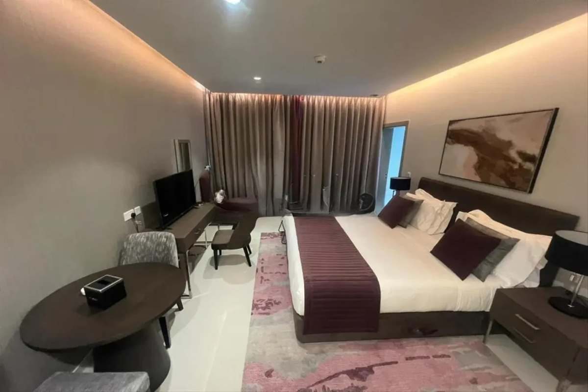 Estudio de Aykon City Tower B con dormitorio y zona de estar