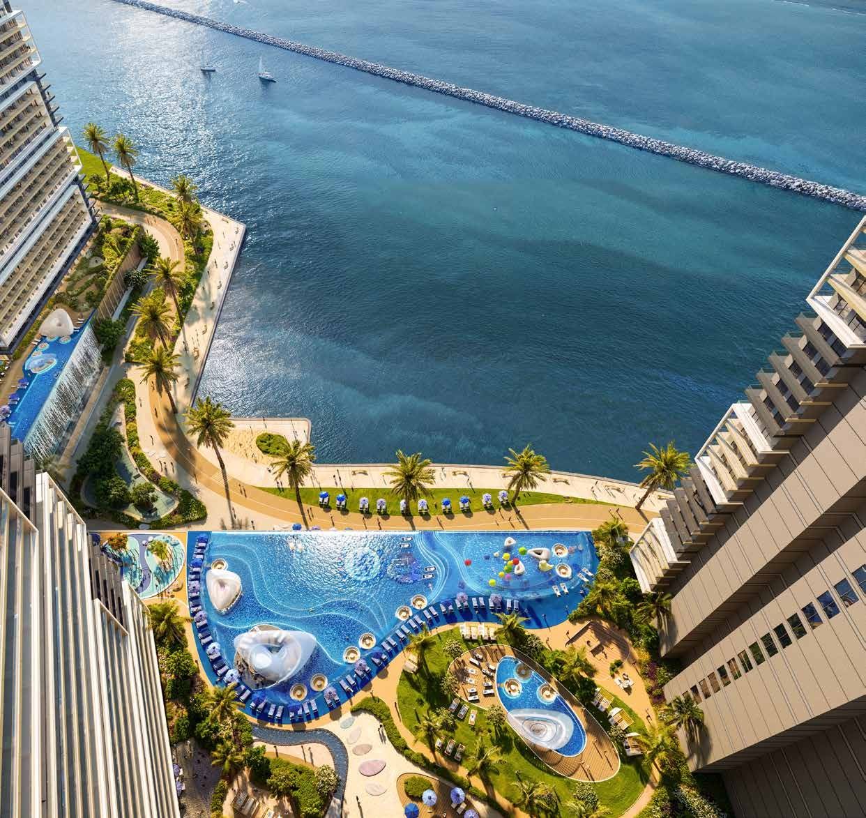 Chelsea Residences by DAMAC, Dubai Maritime City: vista aérea de las piscinas junto al mar