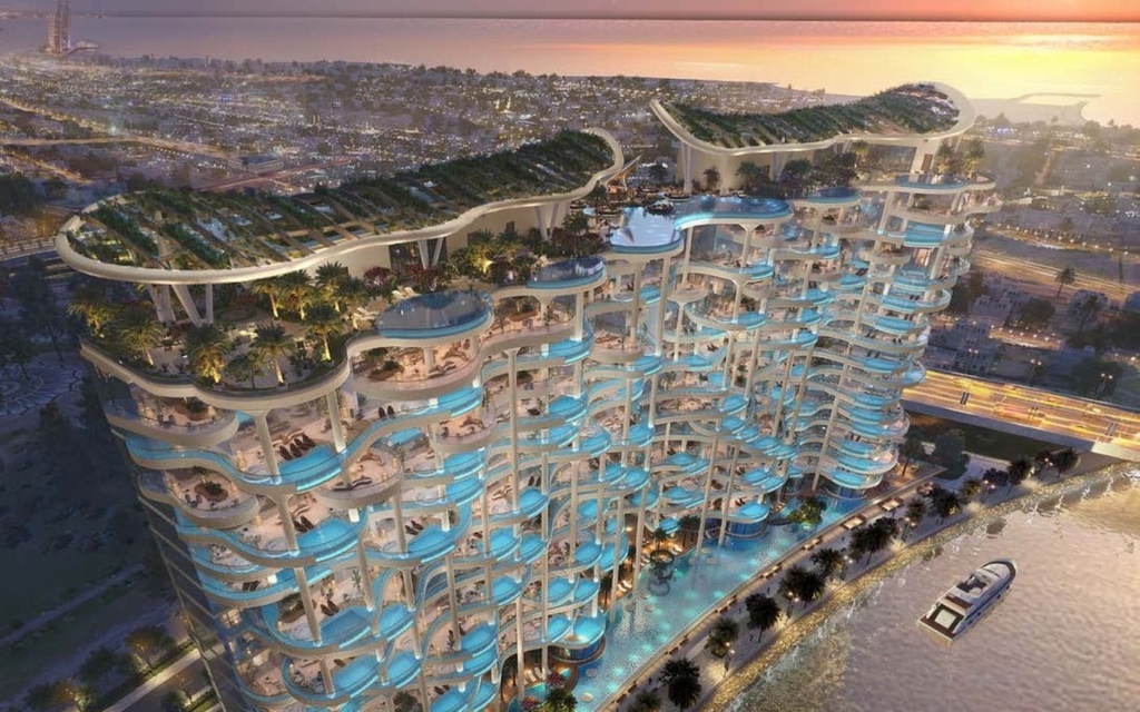 Vista aérea de Couture by Cavalli de DAMAC junto al Dubai Water Canal al atardecer