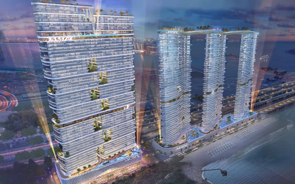 Damac Bay 2, Dubai Harbour: torres residenciales frente al mar de noche