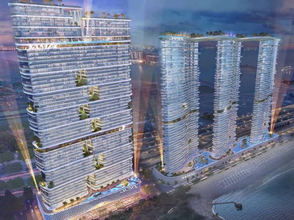 Damac Bay 2, Dubai Harbour: torres residenciales frente al mar de noche
