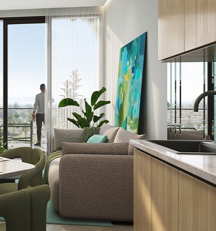 Salón con cocina abierta en Damac Elo