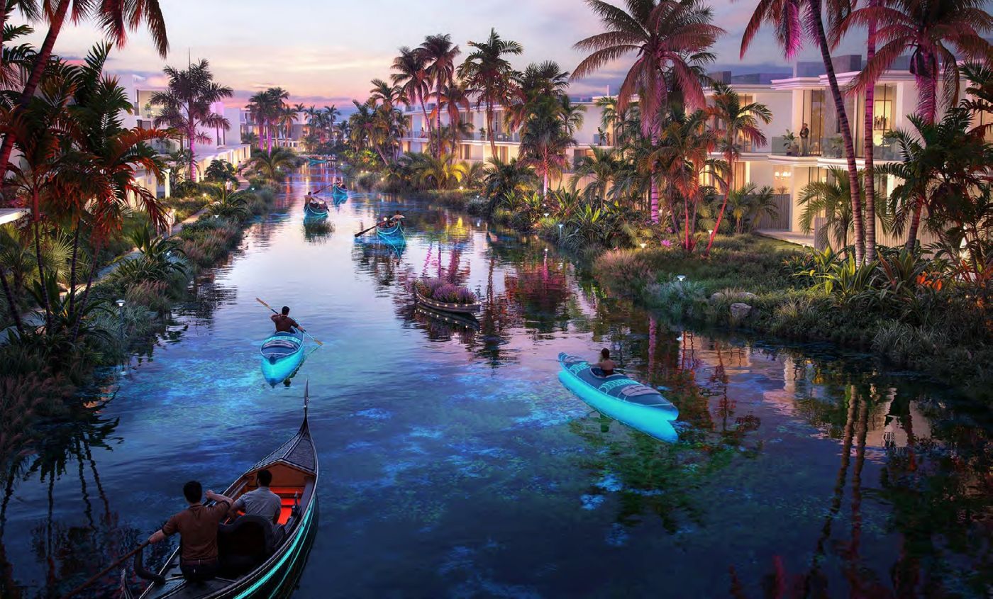 Canal de Damac Islands al anochecer con barcas