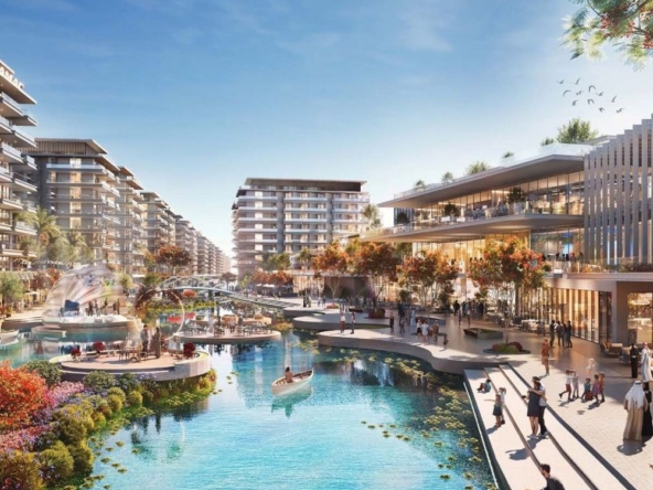 Edificios de Damac Riverside Views junto al canal y el paseo comercial en Dubai Investment Park 2