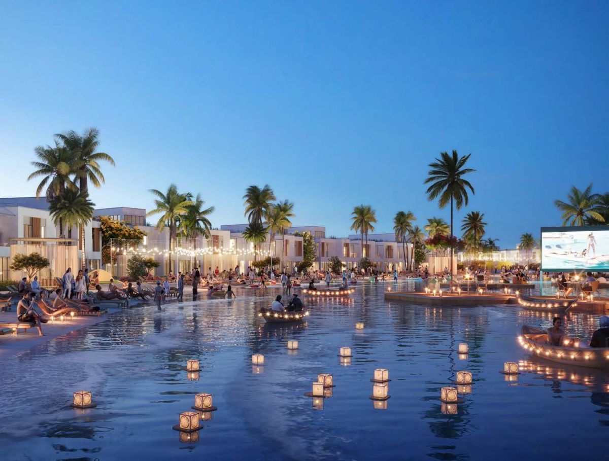 Damac Riverside Views, Dubái: laguna de noche con farolillos