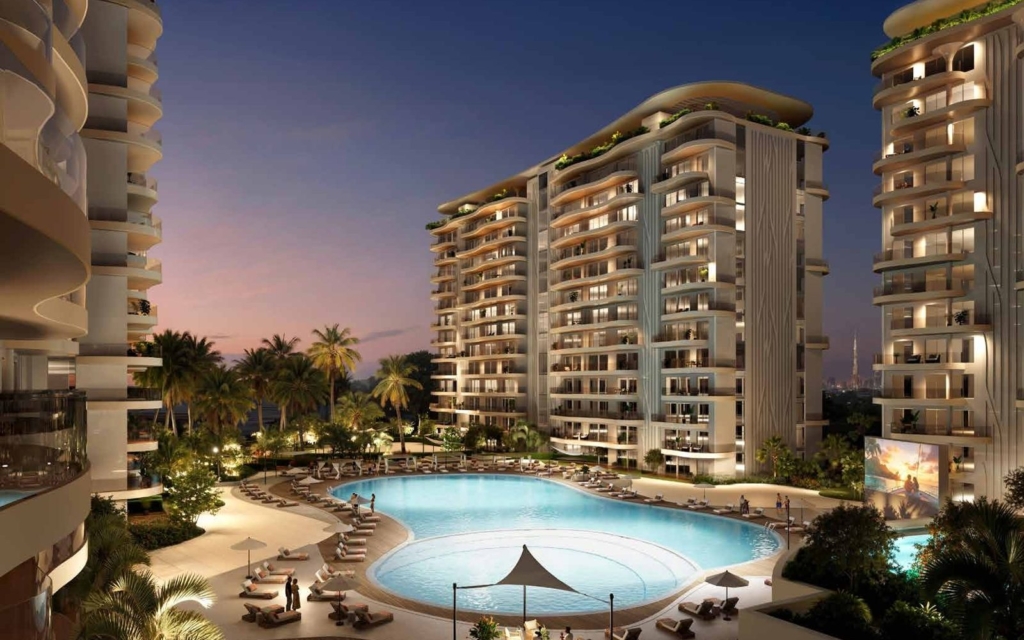 Damac Valencia, DAMAC Lagoons: edificios y piscina al anochecer